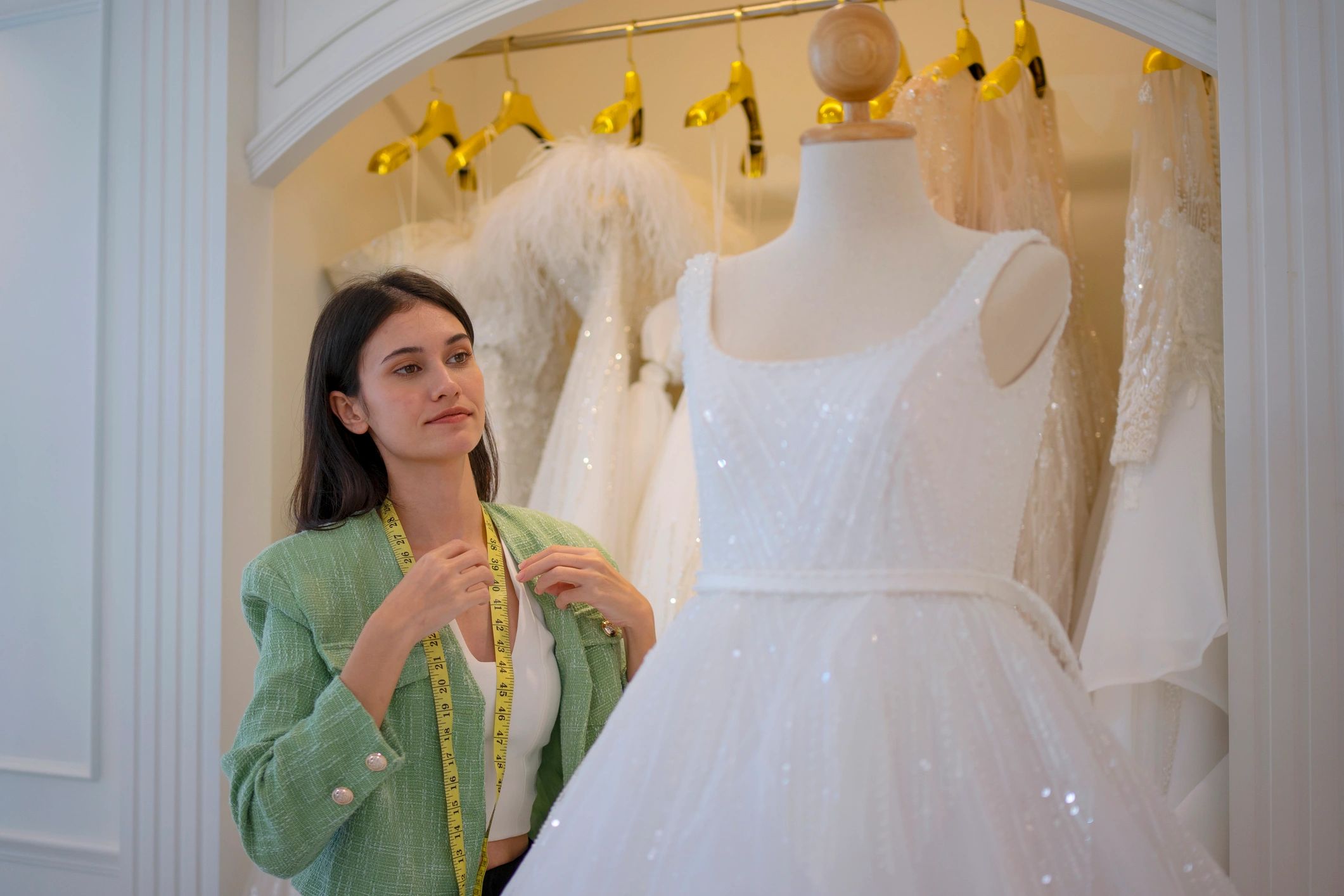 Fashion studio owner working with garments