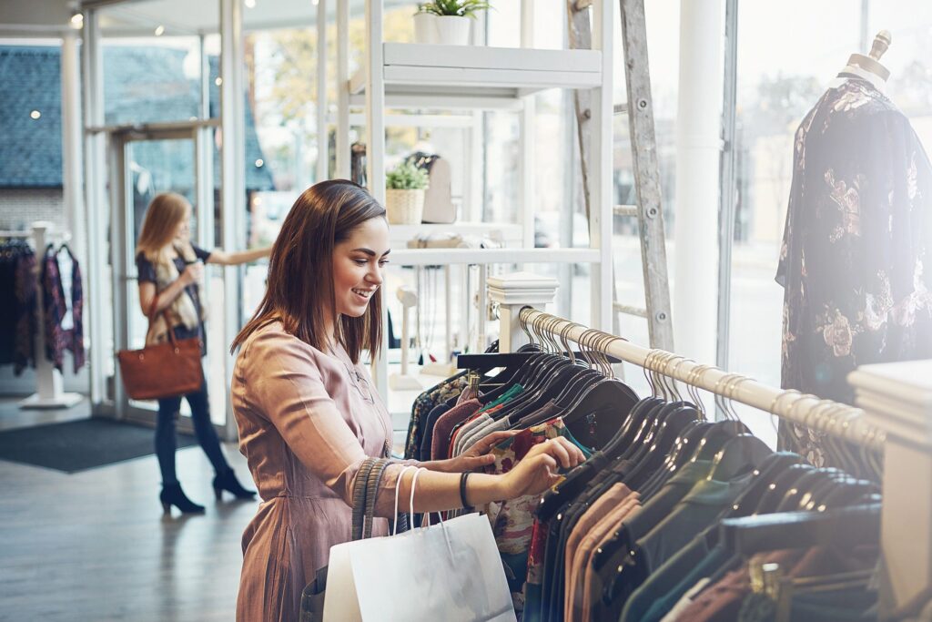 Young woman shopping in a clothing store
